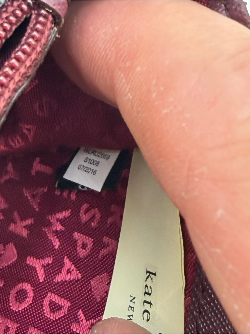 kate spade Zip-Around Wallet in Burgundy with Gold Hardware